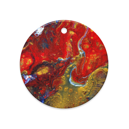 Lava Flow ceramic ornament, round, with marbled red, yellow and blue paint