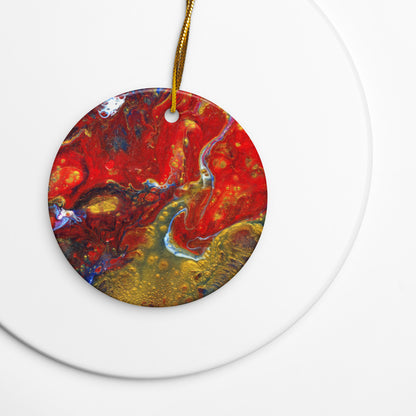 Lava Flow ceramic ornament on a gold string over a white plate