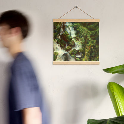 Woodland Waterfall hanging poster on a wall in a bright room