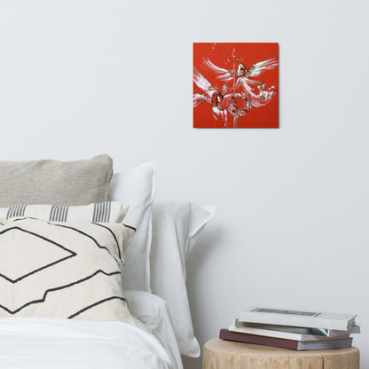 Christmas Angels metal print hanging above a bed with white pillows